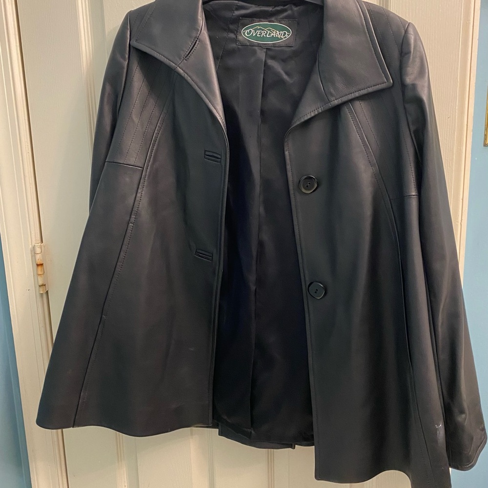 Women's black "leather" jacket.